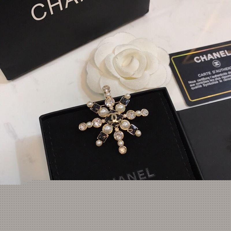 Ch*el brooches
